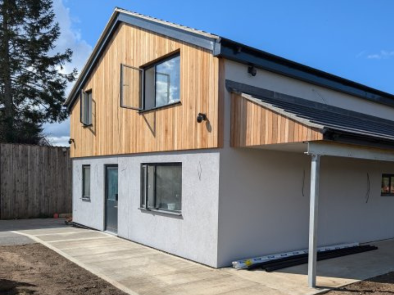 The new Hoveton and Wroxham Sea Scouts HQ. The new Scout building is a two story building, the upper part has exposed timber frame.